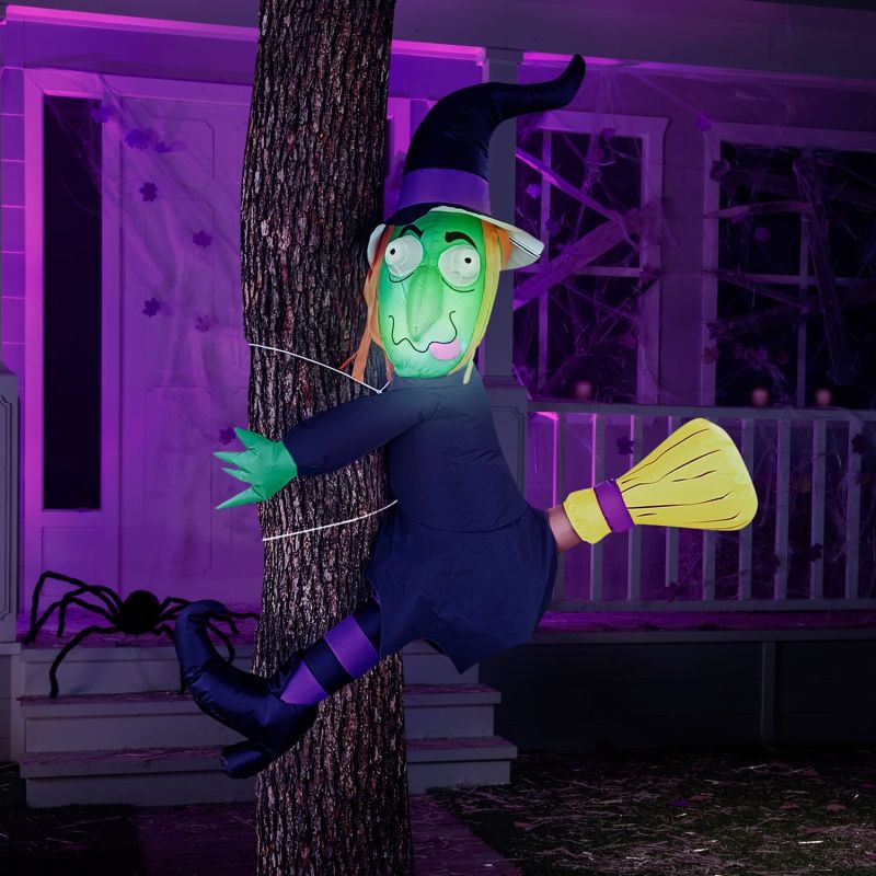 Crashing Witch on tree for Halloween 