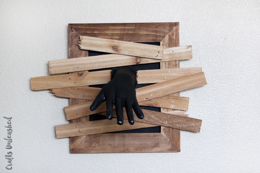 DIY Zombie hand coming out of wooden window