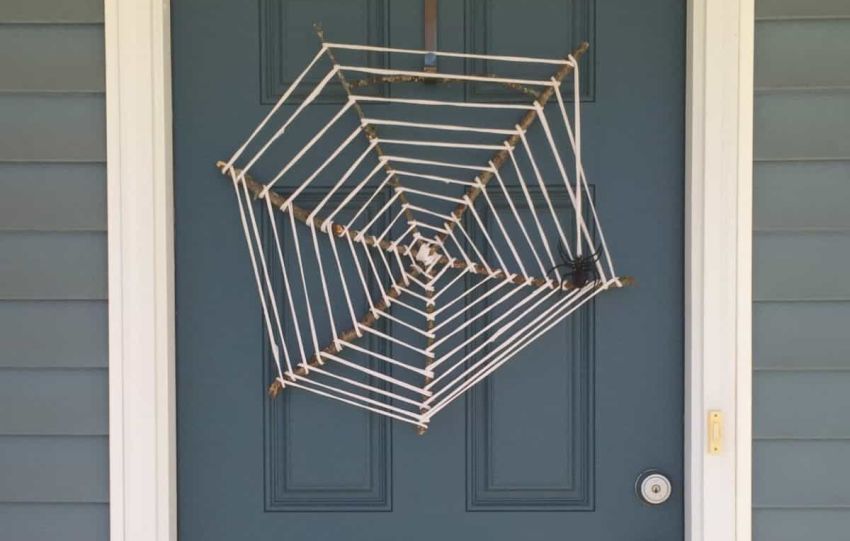 Easy-to-Make Halloween Spider Web Wreath Hanging on Front Door