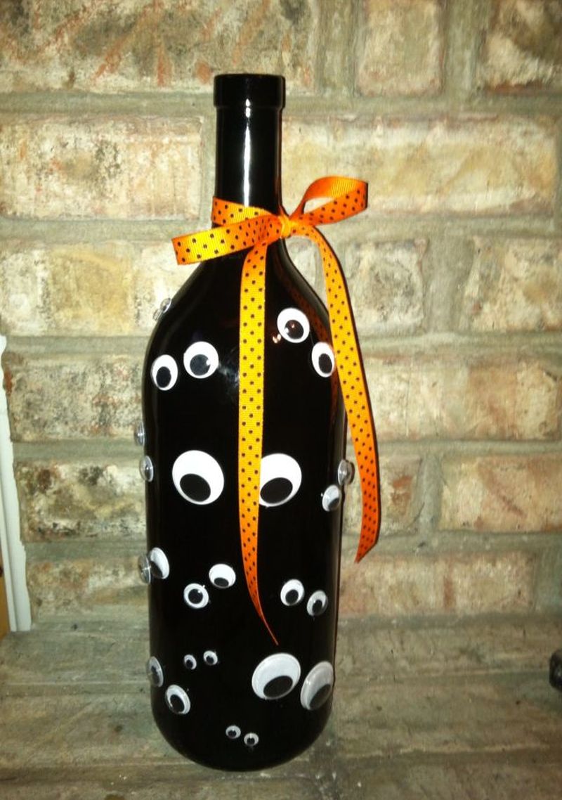 Googly Eye glued on wine bottle