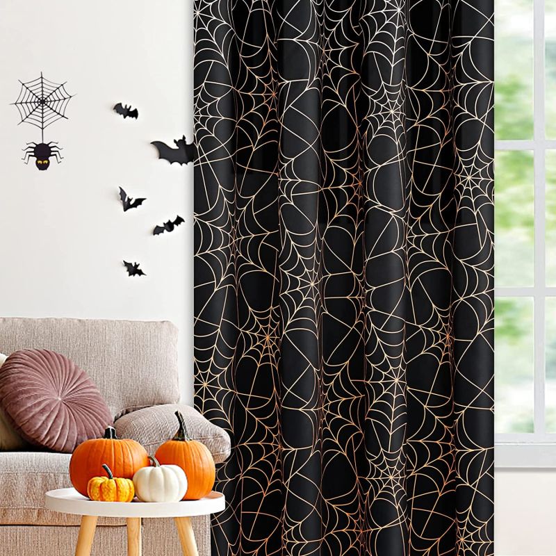 Halloween themed curtain featuring spider web pattern