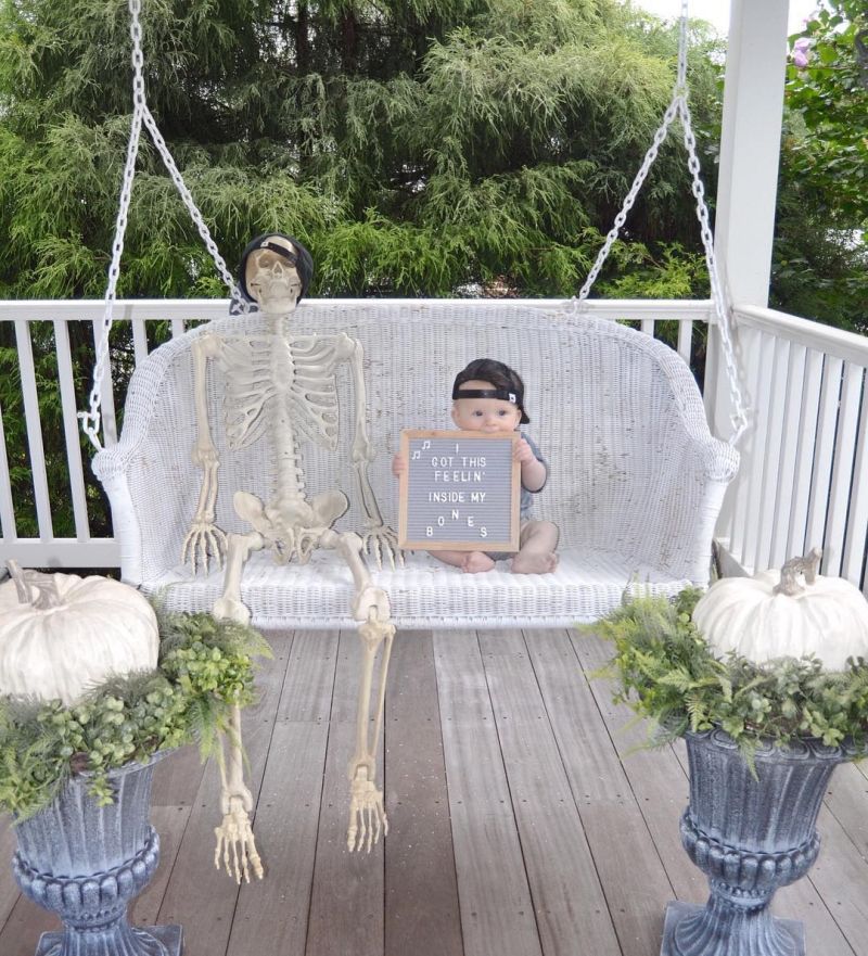 Skeleton on a swing in porch