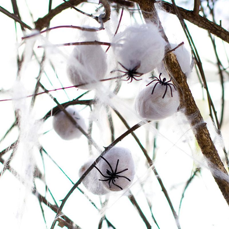 fake spider egg hanging from the tree 
