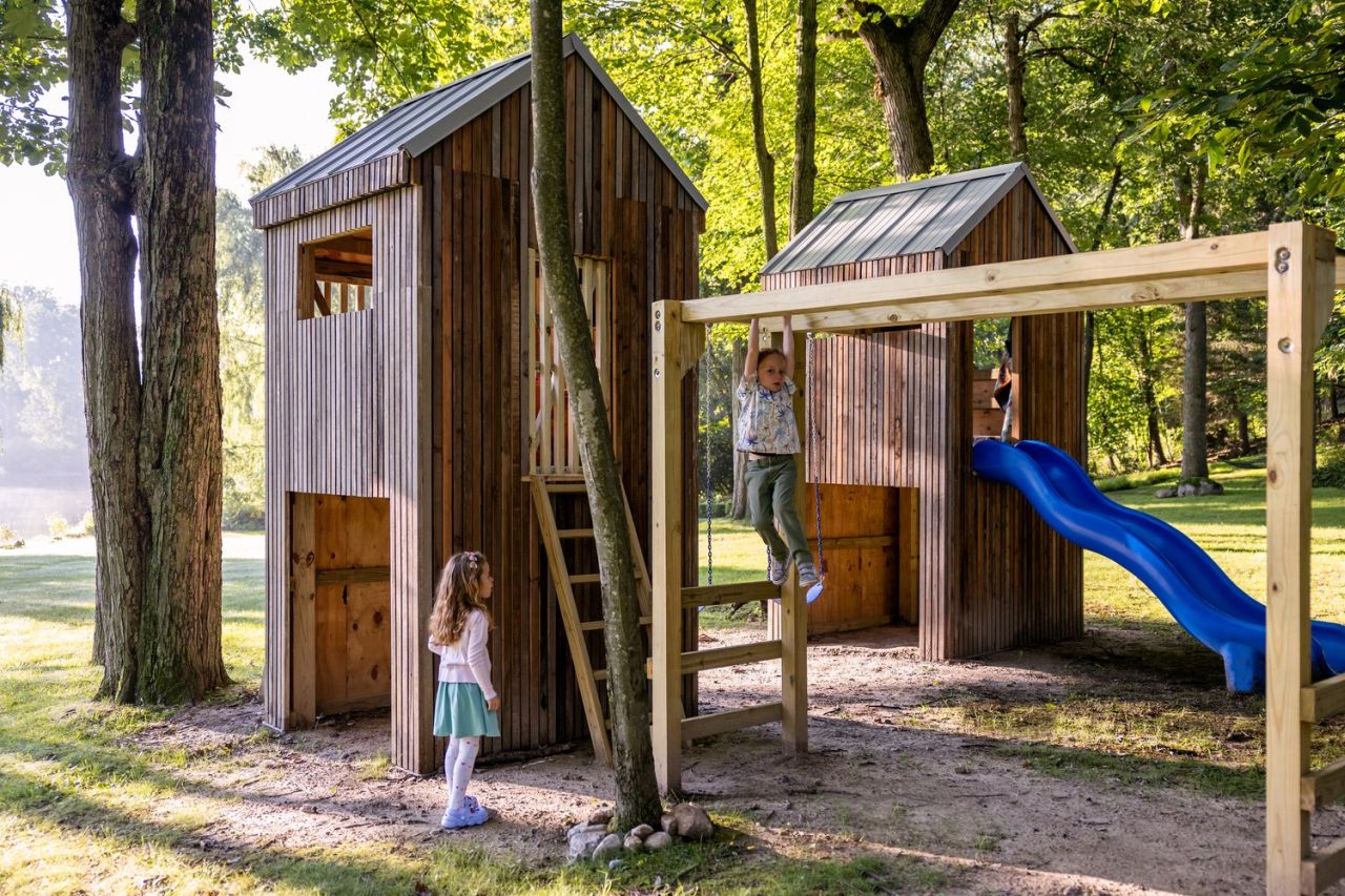 Upcycled Twin Treehouses-slide and monkey bar 1